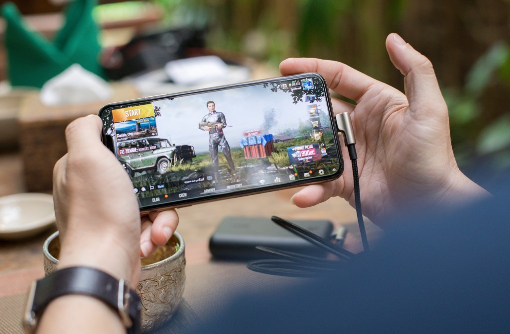 person-playing-pubg-on-smartphone