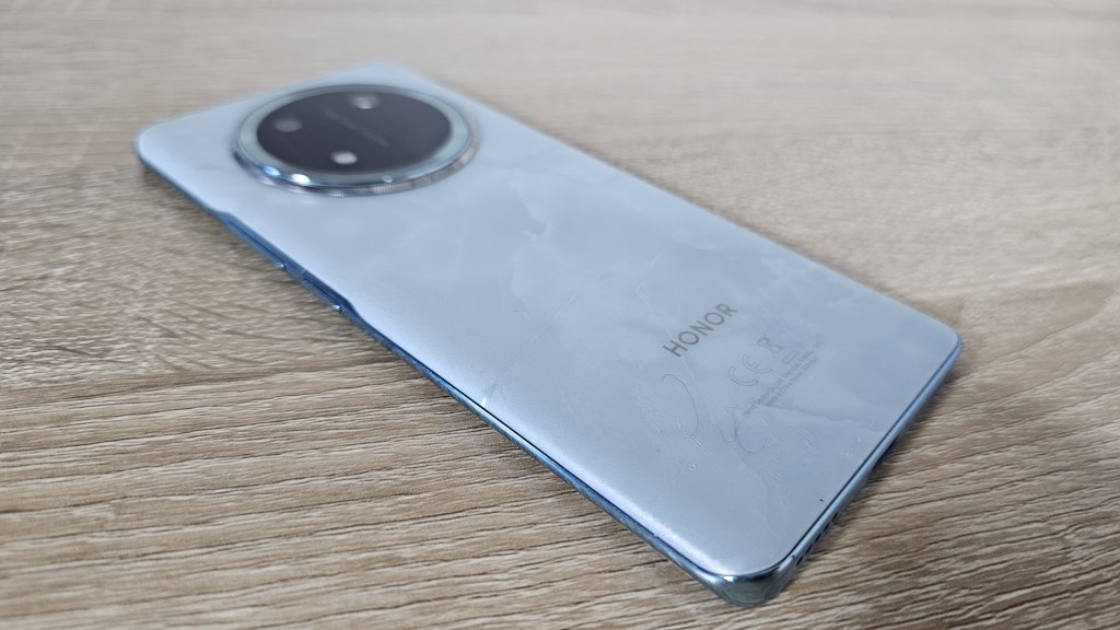 back view of an honor x9c smartphone on a table